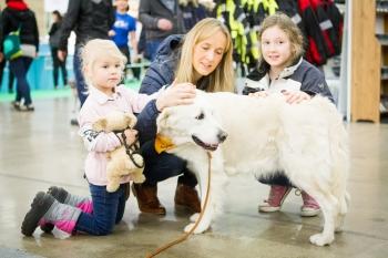 Children and mom with dog